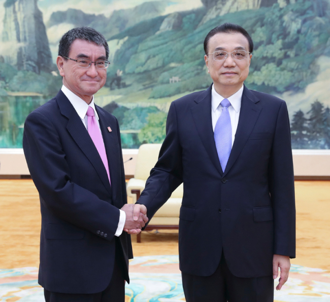 Chinese Premier Li Keqiang meets with visiting Japanese Foreign Minister Taro Kono in Beijing on August 22, 2019. [Photo: gov.cn]