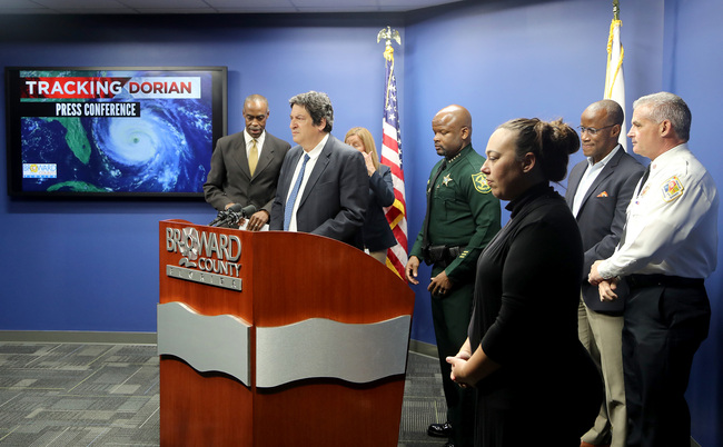 Broward County Mayor Mark Bogen, along with other officials including Broward Sheriff Tony Gregory, Broward Schools Superintendent Robert Runcie, Broward Emergency Management Director Tracey Jackson and Broward County Fire Chief Joe Fernandez, discuss county preparations in anticipation of Hurricane Dorian, August 29, 2019. [Photo: ZUMA Wire via IC]