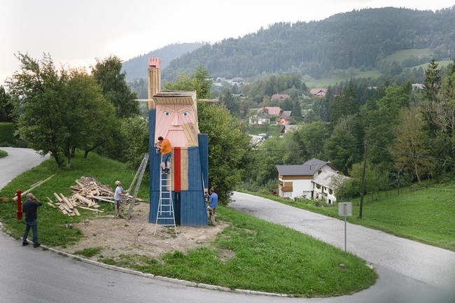 People work on a wooden statue made to resemble US President Donald Trump in the village of Sela pri Kamniku, about 20 miles northeast of Ljubljana in Slovenia, the home country of Trump's wife on August 28, 2019. [Photo: AFP/Jure Makovec]