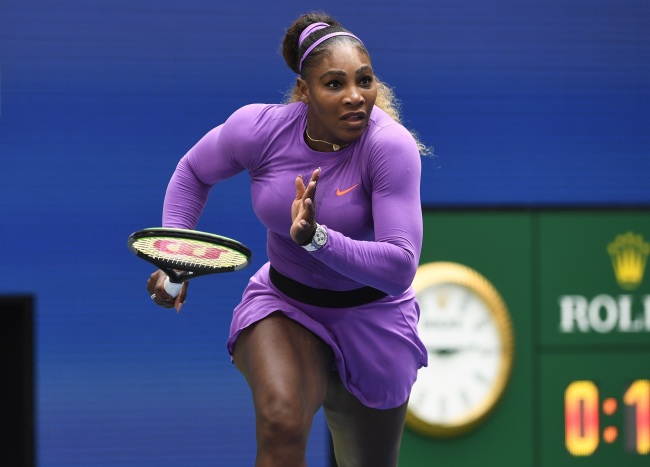 Serena Williams, of the United States, dashes to the net on a return to Petra Martic, of Croatia, during round four of the US Open tennis championships Sunday, Sept. 1, 2019, in New York. [Photo: AP]