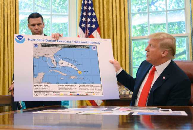 US President Donald Trump and Acting US Secretary of Homeland Security Kevin McAleenan update the media on Hurricane Dorian preparedness from the Oval Office at the White House in Washington, DC, September 4, 2019. [Photo: AFP/ JIM WATSON] 