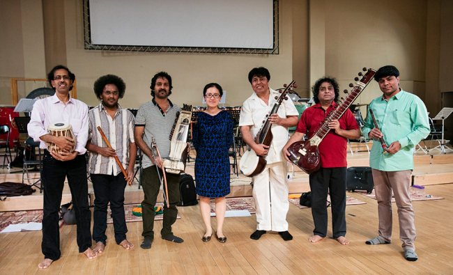 Jiang Ying (middle), the composer and director of ‘Xuan Zang’s Pilgrimage’ with musicians from India. [Photo courtesy of CNTO]