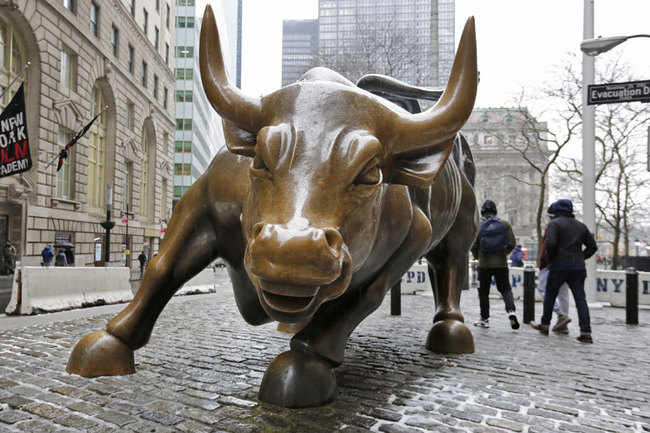 The Charging Bull sculpture by Arturo Di Modica, in New York's Financial District, is shown in this photo, Wednesday, Feb. 7, 2018. (AP Photo/Richard Drew[File Photo: ]