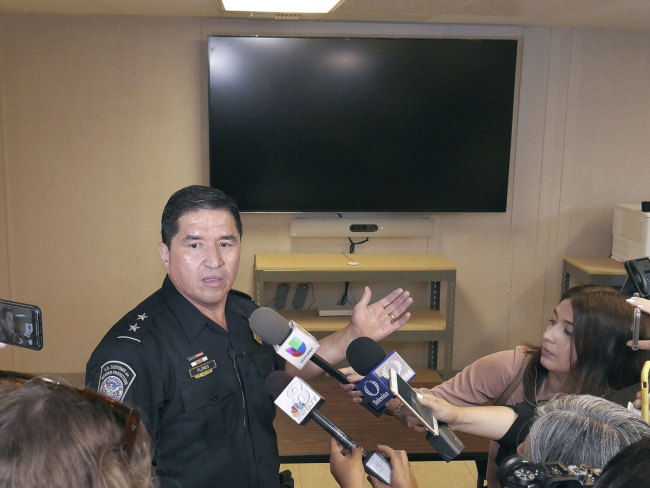 Customs and Border Protection Laredo Port Director, Albert Flores shows one of four Master Courtrooms where immigrants seeking asylum will face an asylum judge via a virtual video conference as members of the media were given a tour, Tuesday, September 10, 2019, of the Migrant Protection Protocols Immigration Hearing Facilities in Laredo, Texas. [Photo: AP]