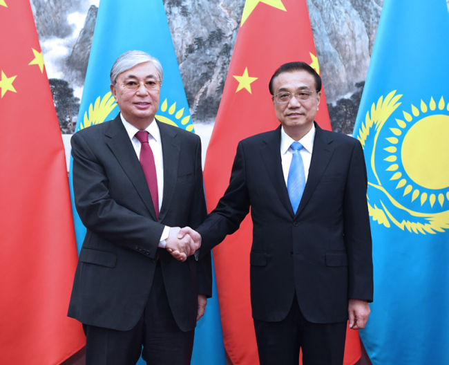 Chinese Premier Li Keqiang (right) meets with Kazakh President Kassym-Jomart Tokayev in Beijing on September 11, 2019. [Photo: Xinhua]