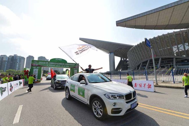 Racing cars depart from the starting line of the 18-day China-ASEAN International Touring Assembly in Nanning, China on Sep 11, 2019. [Photo provided to China Plus]