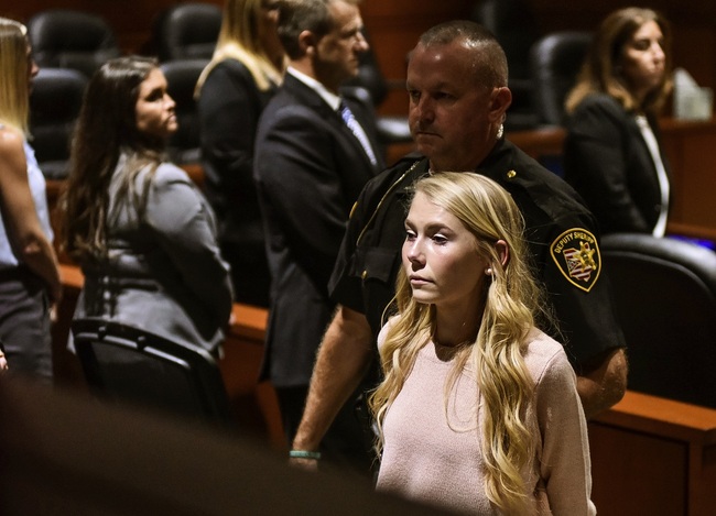 Brooke "Skylar" Richardson is escorted out of the courtroom after the verdict in her trial at Warren County Common Pleas Court Thursday, Sept. 12, 2019 in Lebanon, Ohio. [Photo: AP/Nick Graham/The Journal-News]