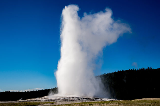 Old Faithful, a cone geyser, is seen in the Upper Geyser Basin, Yellowstone National Park in Wyoming, United States on July 11, 2018.  [Photo: IC]