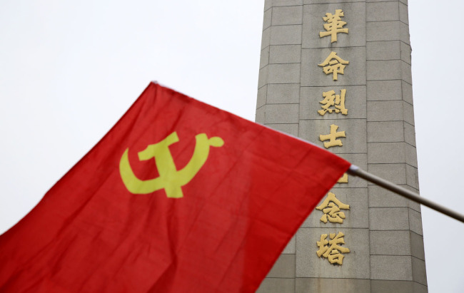 A flag of the Communist Party of China is seen at a cemetery of martyrs in Xiangyang, Hubei Province on June 22, 2019. [Photo: IC]