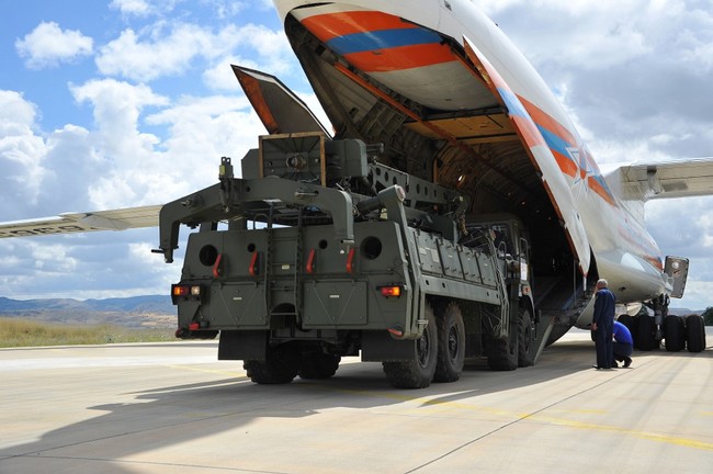 A handout photograph taken on July 12, 2019 by the Turkish Defence Ministry shows a Russian military cargo plane, carrying S-400 missile defense system from Russia, during its unloading at the Murted military airbase in Ankara. [Photo: AFP]