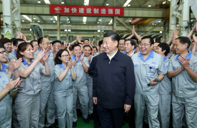 Xi Jinping, general secretary of the Communist Party of China Central Committee, inspects a manufacturing enterprise during his tour in Zhengzhou, Henan Province on September 17, 2019. [Photo: Xinhua]