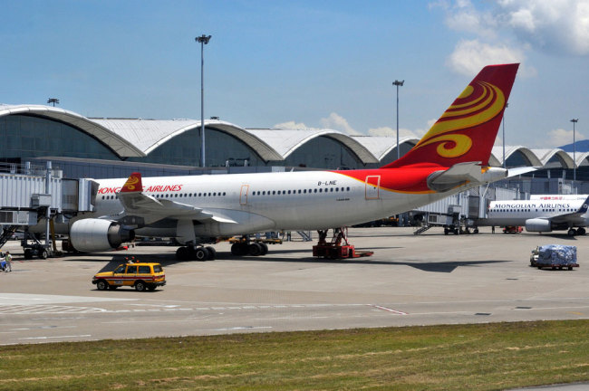 A Hong Kong Airlines plane at the Hong Kong International Airport [File photo: VCG]