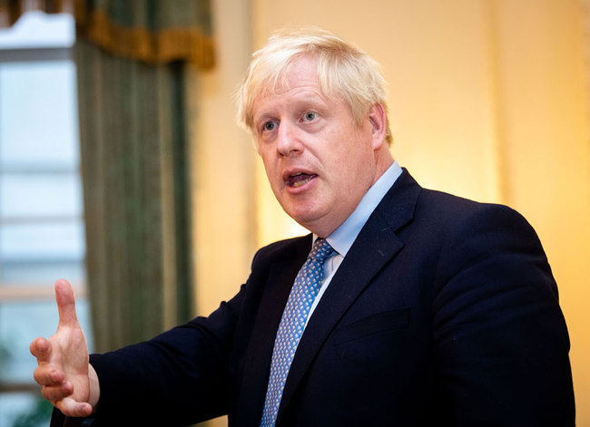 British Prime Minister Boris Johnson hosts various members of the armed services at a military reception at 10 Downing Street on September 18, 2019 in London, England. [Photo: WPA Pool/Getty Images via VCG/John Nguyen]