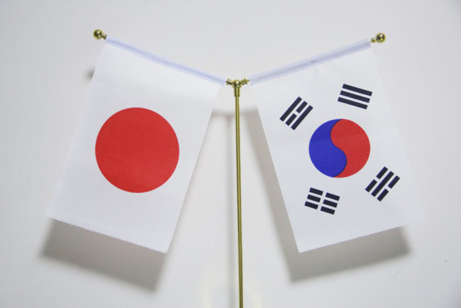 The national flags of Japan and South Korea [File photo: IC]
