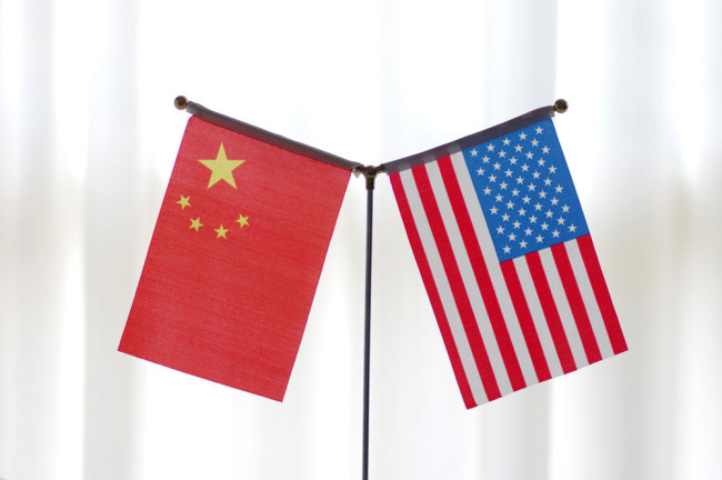 The national flags of China and the United States [File photo: IC]