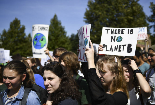 Students gather and march during the Global Climate Strike march in Washington, DC on September 20, 2019. [Photo: AFP/Brendan Smialowski]