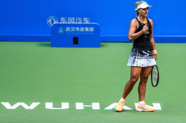 Angelique Kerber reacts during the first round game against Monica Puig at the Wuhan Open in Wuhan, Hubei Province on Sep 23, 2019. [Photo: IC]