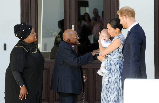 Harry and Meghan, the Duke and Duchess of Sussex and their son Archie meet with Archbishop Desmond Tutu and Mrs. Tutu at the Old Granary Building in Cape Town on September 25, 2019. [Photo: DPA via IC/Albert Nieboer]