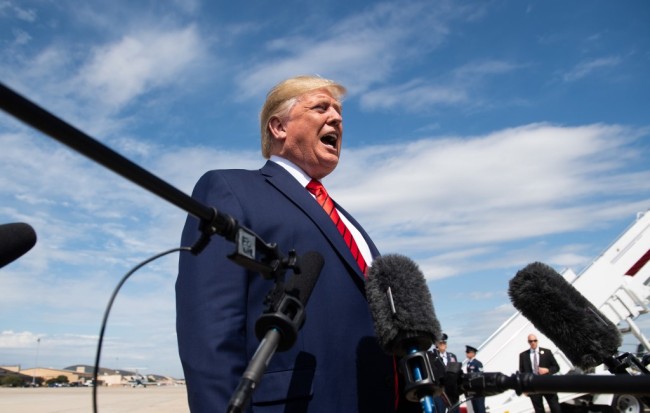 US President Donald Trump speaks to the press after arriving on Air Force One at Joint Base Andrews in Maryland, September 26, 2019, after returning from New York. [Photo: AFP/ SAUL LOEB] 