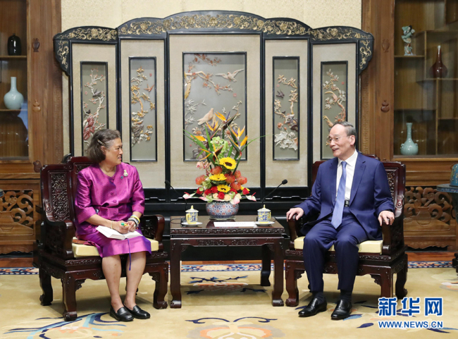 Chinese Vice President Wang Qishan meets with Thai Princess Maha Chakri Sirindhorn in Beijing on Monday, September 30, 2019. [Photo: Xinhua]