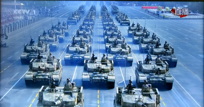 Military vehicles are seen during a military parade celebrating the 70th founding anniversary of the People's Republic of China (PRC) in Beijing, capital of China, Oct. 1, 2019. [Photo: China Plus]
