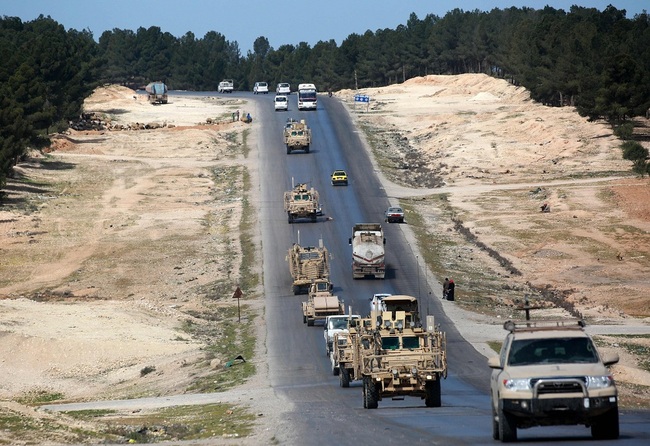 A picture taken on April 3, 2018 shows vehicles of US-backed coalition forces driving in the northern Syrian town of Manbij. [File Photo: VCG]