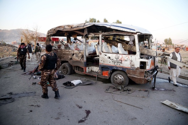 Afghan security officials inspect the scene of a bomb blast in Jalalabad, Afghanistan, October 7, 2019. [Photo: IC]
