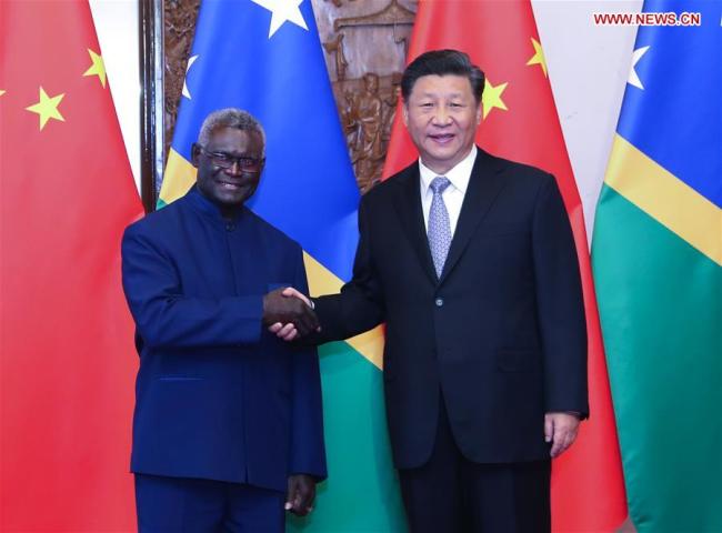 Chinese President Xi Jinping meets with Solomon Islands' Prime Minister Manasseh Sogavare at the Diaoyutai State Guesthouse in Beijing, Oct. 9, 2019. [Photo: Xinhua/Yao Dawei]