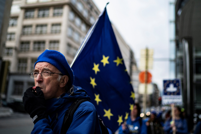 An anti-Brexit activist protests near the European Parliament building in Brussels on October 09, 2019. [File Photo: AFP/Kenzo Tribouillard]