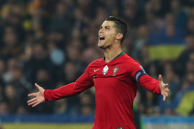 Portugal’s Cristiano Ronaldo makes history with his 700th career goal after scoring a penalty during the UEFA Euro 2020 qualifying round, Group B soccer match Ukraine vs Portugal at Olympic stadium, in Kiev, Ukraine, 14 October 2019. [Photo: IC]