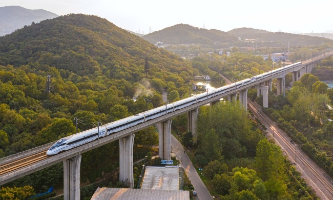 A high-speed train runs past Nanjing, Jiangsu Province, on October 18, 2019. [Photo: IC]