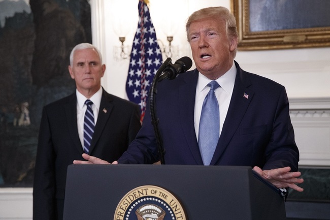 US President Donald J. Trump (R), with Vice President Mike Pence (L), announces the lifting of sanctions on Turkey during a statement in the Diplomatic Reception Room of the White House in Washington, DC, USA, October 23, 2019. [Photo: IC/EPA/SHAWN THEW]