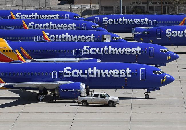 In this file photo taken on March 28, 2019 Southwest Airlines Boeing 737 MAX aircraft are parked on the tarmac after being grounded, at the Southern California Logistics Airport in Victorville, California. [Photo: AFP]