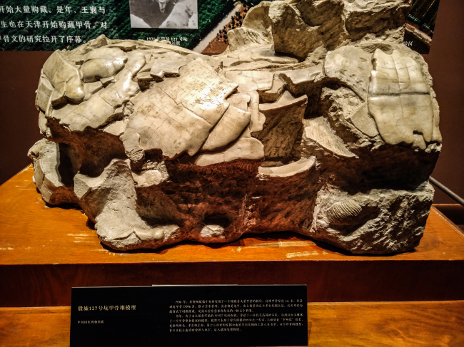 A model of oracle bones is exhibited in the National Museum in Beijing, China. [Photo: VCG]