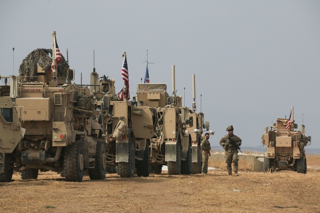 File Photo: American military convoy stops near the town of Tel Tamr, north Syria, Sunday, Oct. 20, 2019.  [Photo: AP/Baderkhan Ahmad]