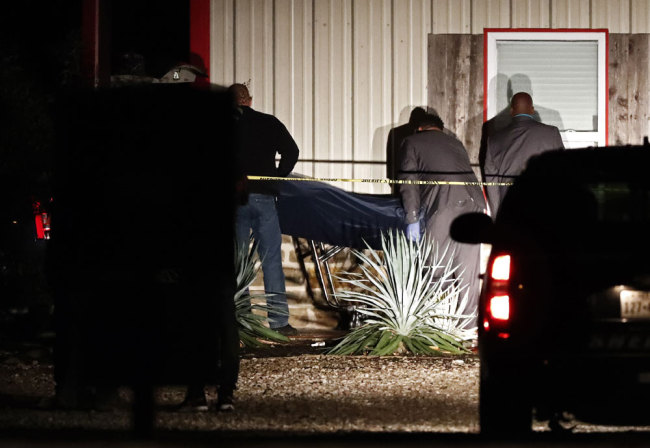 Bodies are removed from the Party Venue after a shooting in Greenville, Texas, USA, October 27, 2019. [Photo: EPA via IC/Larry W. Smith]