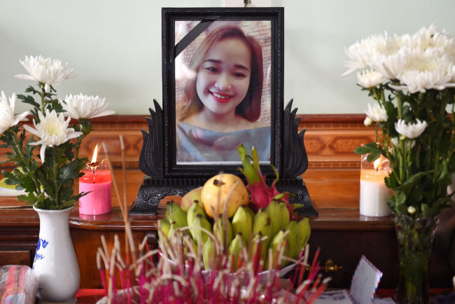 A portrait of Bui Thi Nhung, who is feared to be among the 39 people found dead in a truck in Britain, is kept on a prayer altar at her house in Vietnam's Nghe An province on October 27, 2019. [Photo: AFP/Nhac Nguyen]