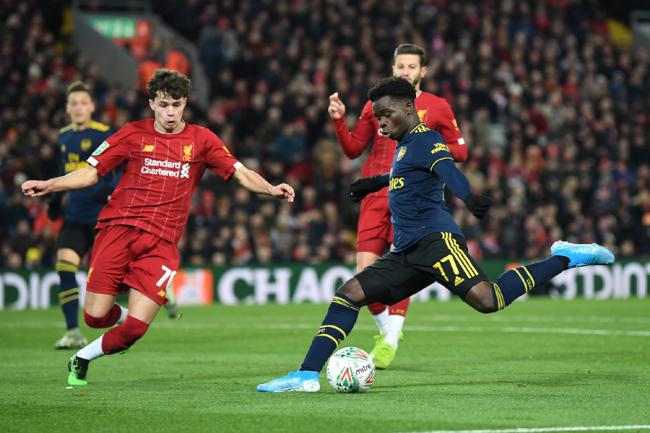 Bukayo Saka of Arsenal is closed down by Neco Williams of Liverpool during the Carabao Cup Round of 16 match between Liverpool and Arsenal at Anfield on October 30, 2019 in Liverpool, England.  [Photo: VCG]