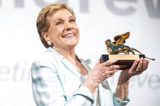 Actress Julie Andrews holds her Golden Lion for Lifetime Achievement awarded at the 76th edition of the Venice Film Festival, Venice, Italy, Monday, Sept. 2, 2019.[Photo: AP]