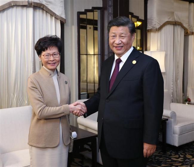 Chinese President Xi Jinping meets with Chief Executive of Hong Kong Special Administrative Region (HKSAR) Carrie Lam, who is here for the second China International Import Expo (CIIE), in Shanghai, east China, Nov. 4, 2019. [Photo: Xinhua/Ju Peng]