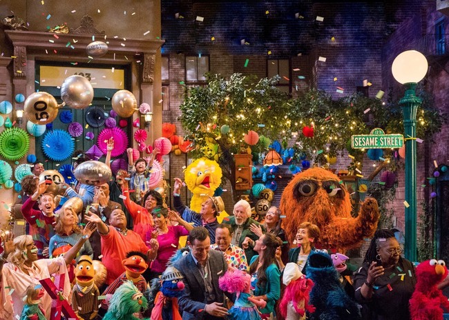 This image released by HBO shows the cast of "Sesame Street" during a celebration of their 50th season of the popular children's TV show. [Photo: AP]