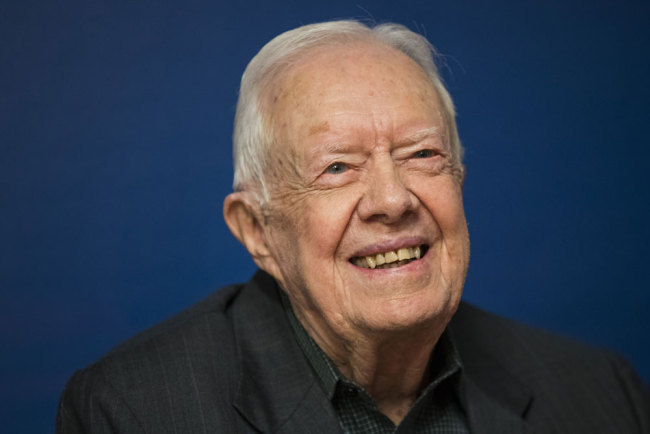 In this file photo Former U.S. President Jimmy Carter smiles during a book signing event for his new book 'Faith: A Journey For All' at Barnes & Noble bookstore in Midtown Manhattan, March 26, 2018 in New York City. [Photo: AFP/Drew Angerer]