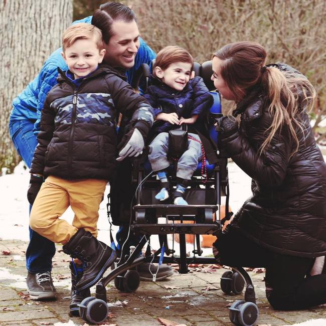 File photo of Nash in his wheelchair with his family. [Photo from Facebook account of Brittany Stineman]