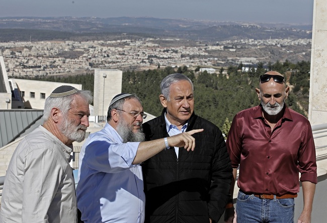 Israeli Prime Minister Benjamin Netanyahu, center, meets with heads of Israeli settlement authorities at the Alon Shvut settlement, in the Gush Etzion block, in the occupied the West Bank, Tuesday, Nov. 19, 2019. [Photo: Menahem Kahana/Pool via AP]