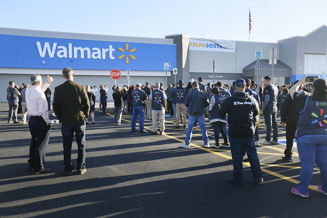 File Photo: Shoppers wait to enter the Walmart store for a reopening event, Thursday, Nov. 14, 2019 in El Paso, Texas. [Photo: Briana Sanchez /The El Paso Times via AP]