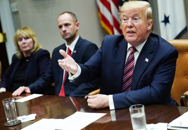 US President Donald Trump takes part in a round table discussion on business and red tape reduction in the Roosevelt Room of the White House in Washington, DC on December 6, 2019. [Photo: AFP]