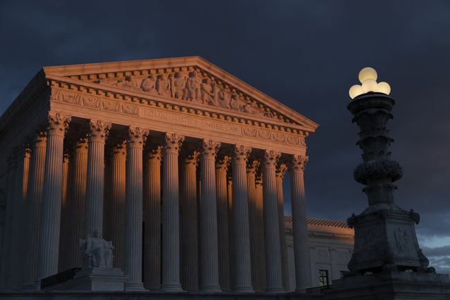 In this Jan. 24, 2019, file photo, the Supreme Court is seen at sunset in Washington. The Supreme Court is preventing the Trump administration from re-starting federal executions next week after a 16-year break. The court on Dec. 6, denied the administration's plea to undo a lower court ruling in favor of inmates who have been given execution dates. [Photo: AP]