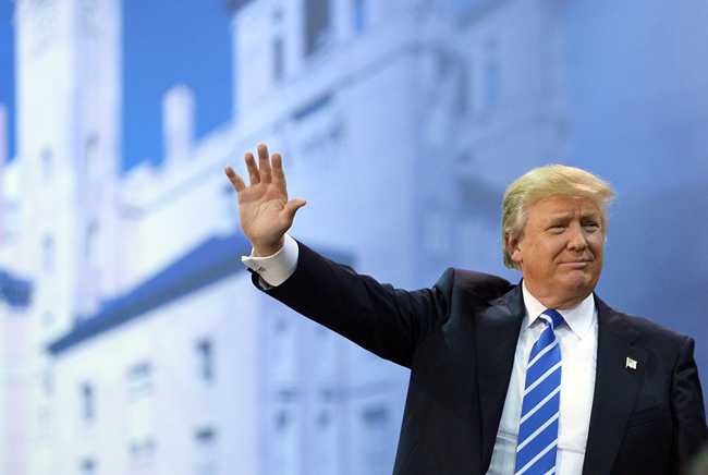 Republican presidential candidate Donald Trump speaks during a rally at the Expo Hall of the Richmond International Raceway on October 14, 2015 in Richmond, Virginia. [Photo: MANDEL NGAN/AFP]