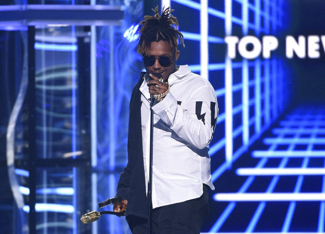 In this May 1, 2019 file photo, Juice WRLD accepts the award for top new artist at the Billboard Music Awards at the MGM Grand Garden Arena in Las Vegas. [File photo: AP]