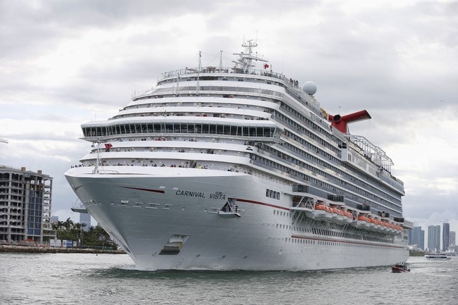 The Carnival Cruise Ship 'Carnival Vista' heads out to sea escorted by a coast guard vessel in the Miami harbor entrance known as Government Cut in Miami, Florida June 2, 2018. [File photo: AFP]